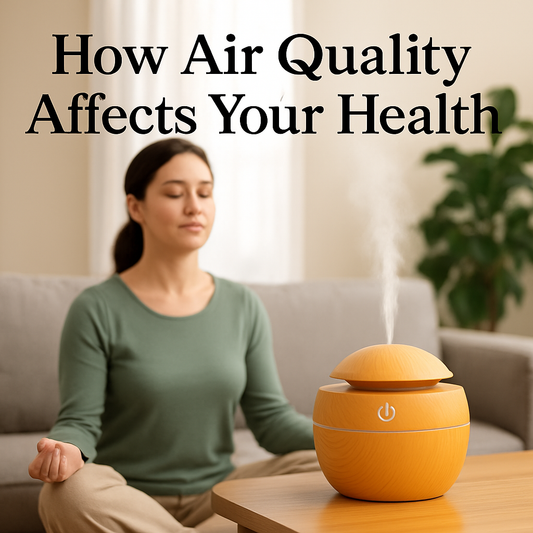 Woman meditating on a sofa with a wood‑grain aromatherapy diffuser releasing mist in a living room, illustrating how air quality affects health.
